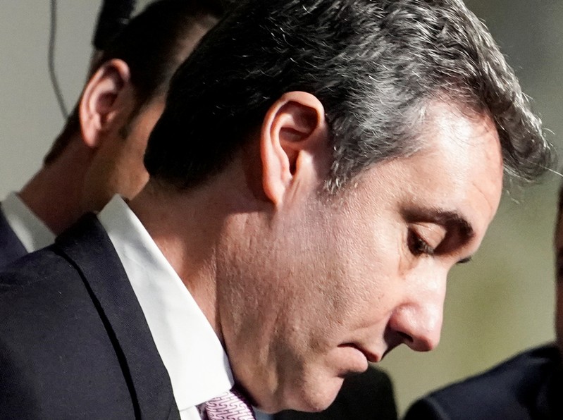 Former Trump personal attorney Cohen departs after testifying before Senate Intelligence Committee on Capitol Hill in Washington