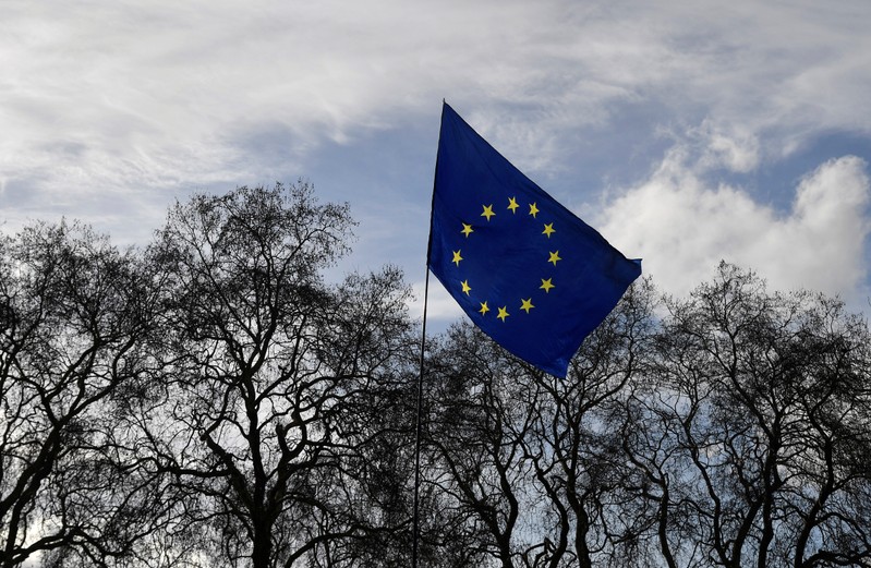 An EU flag is seen flying near the Houses of Parliament in London, Britain