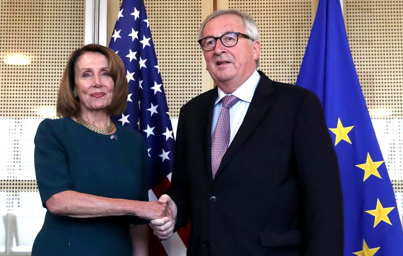 U.S. Speaker of the House of Representatives Nancy Pelosi is welcomed by European Commission President Jean-Claude Juncker at EU Commission headquarters in Brussels