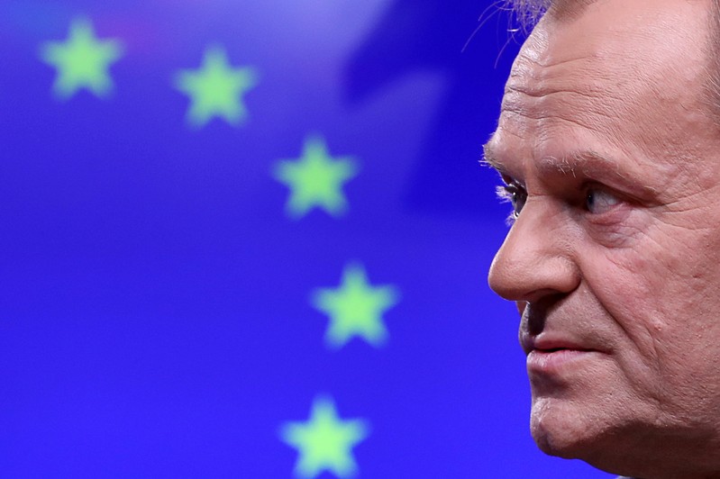 EU Council President Donald Tusk gives a statement after a meeting at the European Council headquarters in Brussels