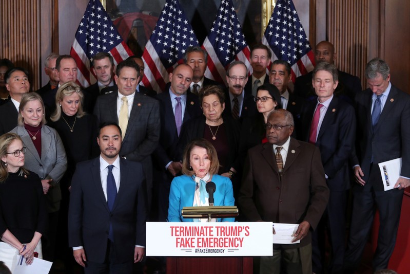 U.S. House Speaker Pelosi, flanked by Representative Castro, holds a news conference about their proposed resolution to terminate Trump's Emergency Declaration, at the U.S. Capitol in Washington