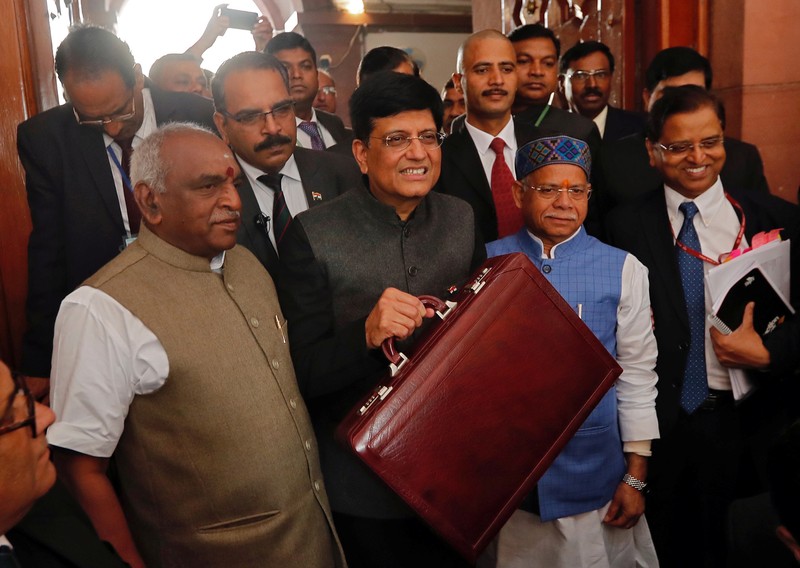 India's interim Finance Minister Piyush Goyal holds his briefcase as he arrives at the parliament to present 2019-20 budget in New Delhi