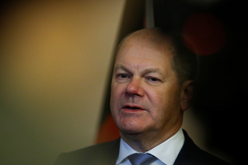 German Finance Minister Olaf Scholz attends a media briefing during his visit to Beijing
