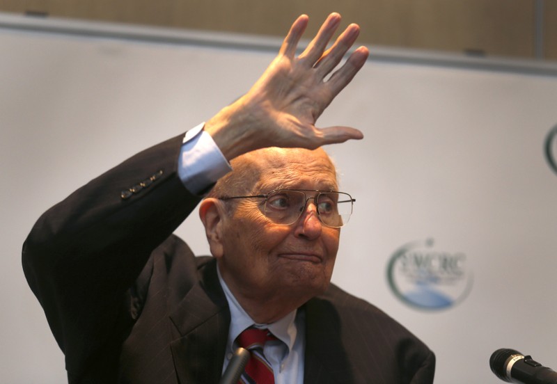FILE PHOTO - Rep. John Dingell, D-Mich, acknowledges the audience during a luncheon in Southgate