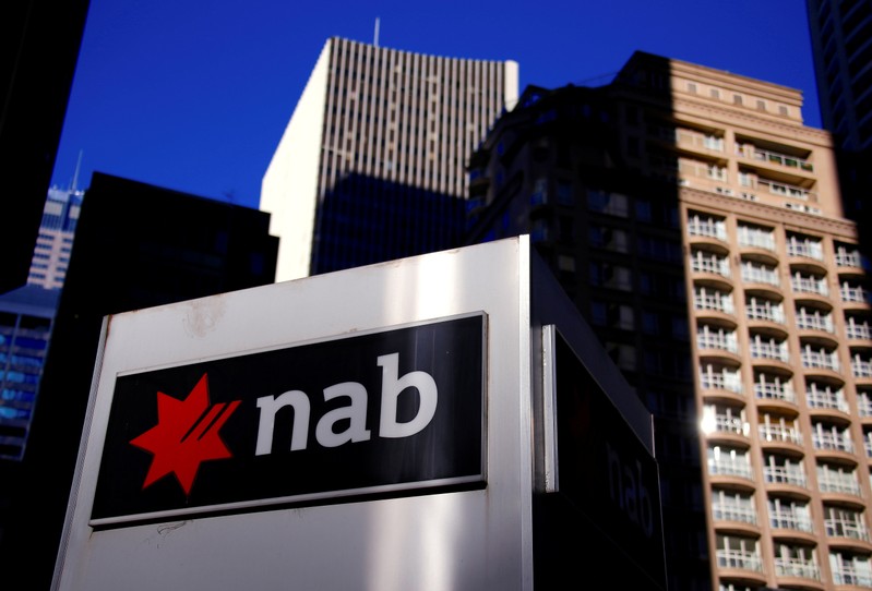 FILE PHOTO - The logo of the National Australia Bank is displayed outside their headquarters building in central Sydney