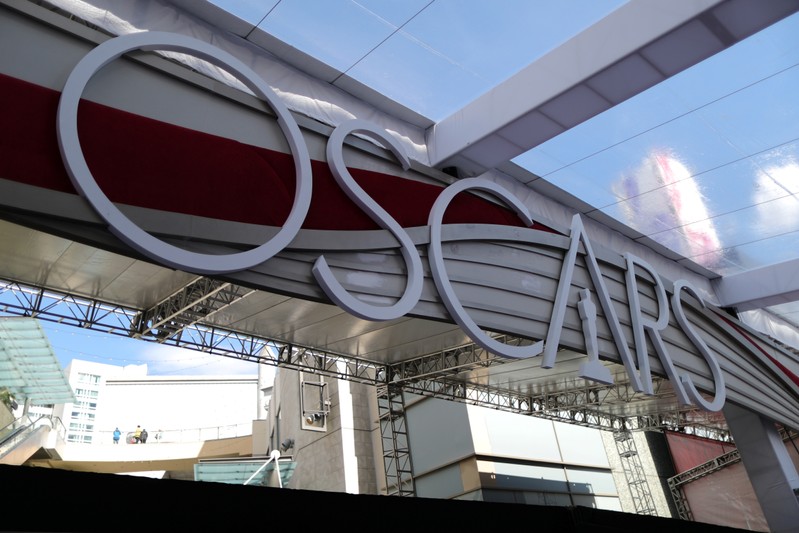 FILE PHOTO: An Oscars sign tops the fan bleachers on the red carpet as preparations continue for the 91st Academy Awards in Hollywood, Los Angeles