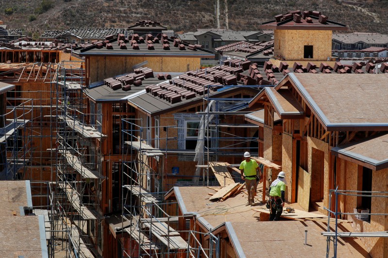 FILE PHOTO: Development and construction continues on a large scale housing project of over 600 homes in Oceanside, California