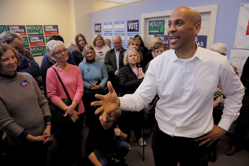 FILE PHOTO: U.S. Senator Cory Booker encourages volunteer campaign canvassers ahead of the midterm elections in Portsmouth, New Hampshire