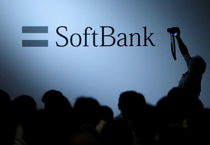 FILE PHOTO - The logo of SoftBank Group Corp is displayed at SoftBank World 2017 conference in Tokyo
