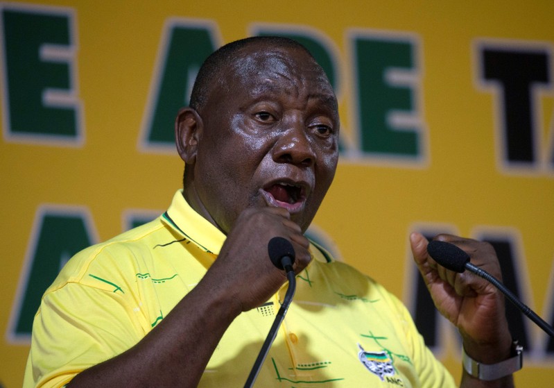 FILE PHOTO: South African President Cyril Ramaphosa speaks during a rally celebrating the 107th anniversary of the African National Congress in Durban