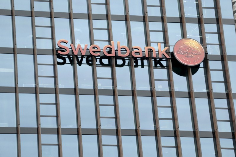 FILE PHOTO: File photo shows Swedbank's logo on its Lithuanian headquarters in Vilnius