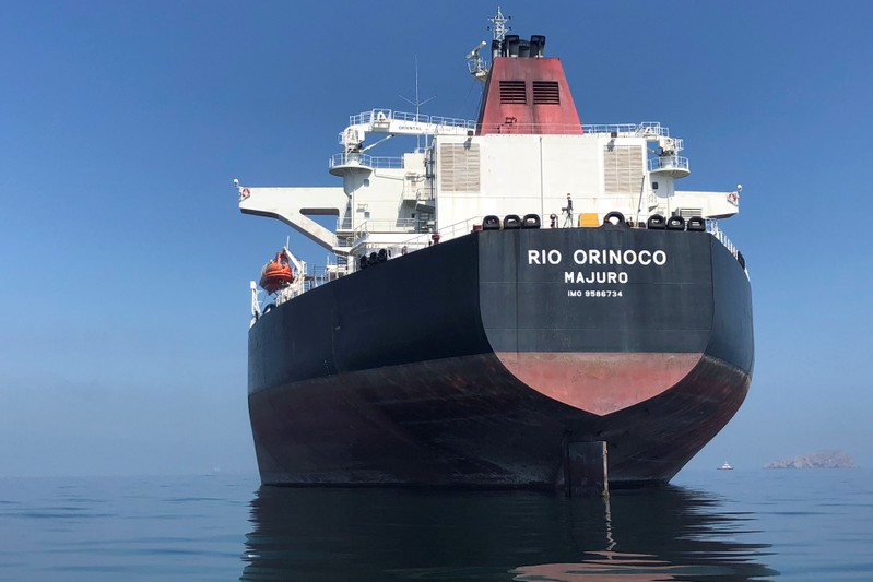 FILE PHOTO: An oil tanker is seen at sea outside the Puerto La Cruz oil refinery in Puerto La Cruz