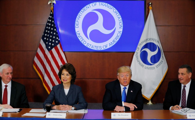 FILE PHOTO: U.S. President Donald Trump participates in a roundtable discussion at the Department of Transportation in Washington