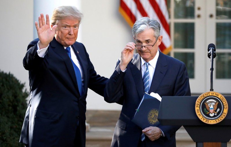 FILE PHOTO: U.S. President Donald Trump gestures with Jerome Powell, his nominee to become chairman of the U.S. Federal Reserve at the White House in Washington