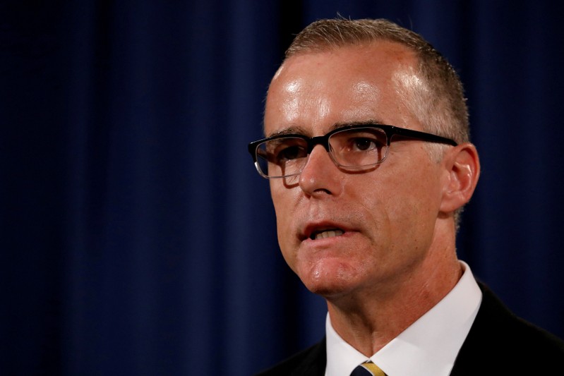 FILE PHOTO: Acting FBI Director Andrew McCabe announces the results of the national health care fraud takedown during a news conference at the Justice Department in Washington