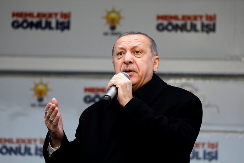 Turkish President Tayyip Erdogan addresses his supporters during a rally for the upcoming local elections in Istanbul