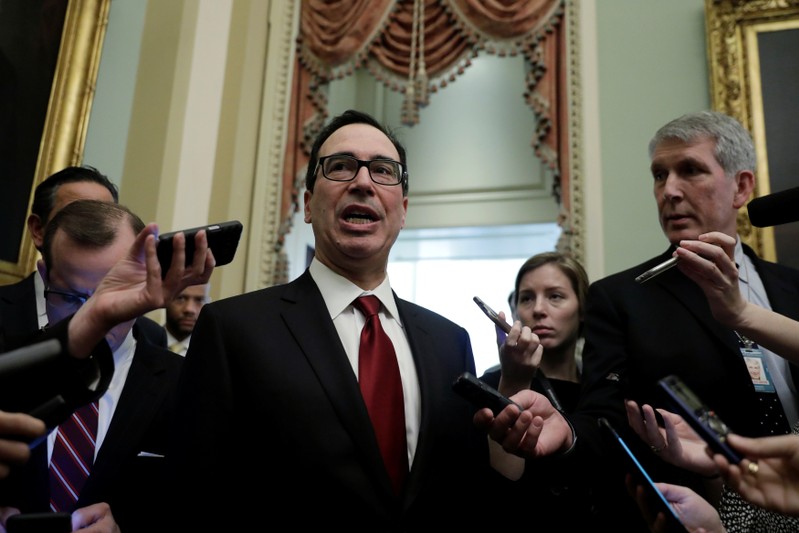 FILE PHOTO - U.S. Treasury Secretary Steve Mnuchin speaks to Capitol Hill reporters in Washington