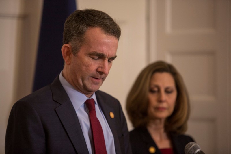 Virginia Governor Ralph Northam, accompanied by his wife Pamela Northam announces he will not resign during a news conference in Richmond