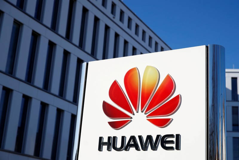 FILE PHOTO: The logo of Huawei Technologies is pictured in front of the German headquarters of the Chinese telecommunications giant in Duesseldorf