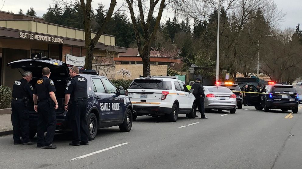 Seattle police work at the scene of a shooting in Seattle on Wednesday, March 27, 2019. Four people including a metro bus driver were shot Wednesday afternoon, and one person has been detained, police said.