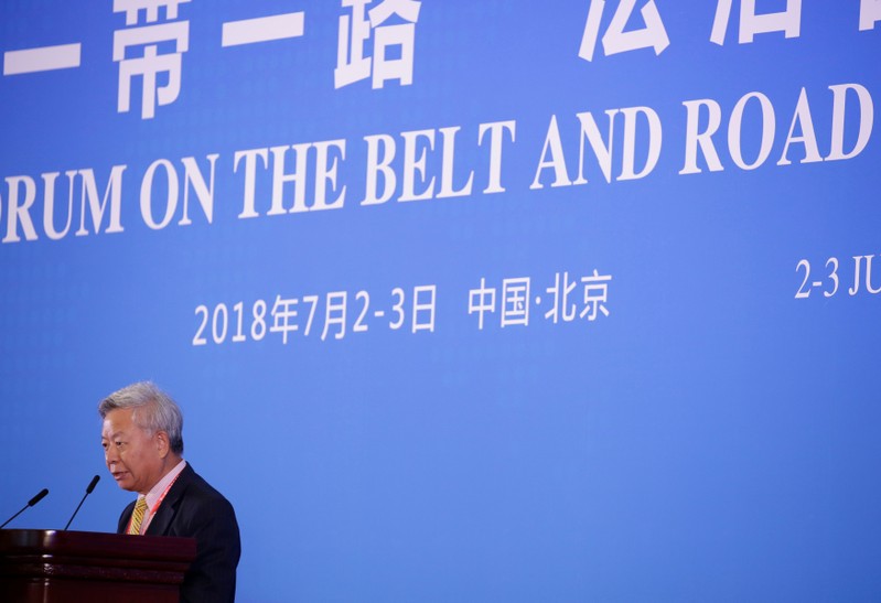 AIIB president Jin Liqun speaks at an international forum on the 