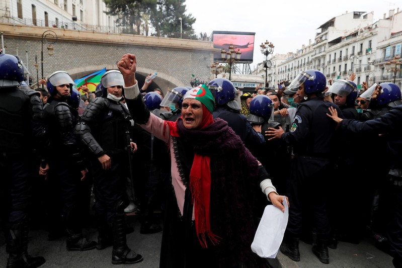 A woman protests against Algeria's President Abdelaziz Bouteflika, in Algiers