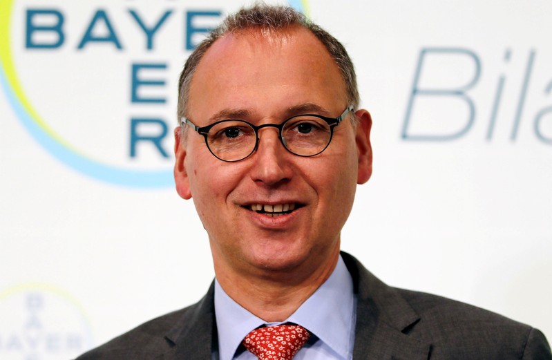 FILE PHOTO: Werner Baumann, CEO of Bayer AG poses for a picture during the annual results news conference of the German drugmaker in Leverkusen