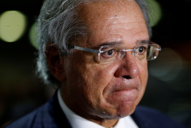 FILE PHOTO: Brazil's Economy Minister Paulo Guedes is seen before meeting with Brazil's President Jair Bolsonaro at the National Congress, in Brasilia