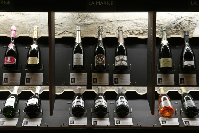 Bottles of Champagne are displayed at Dilettantes wine shop in Paris