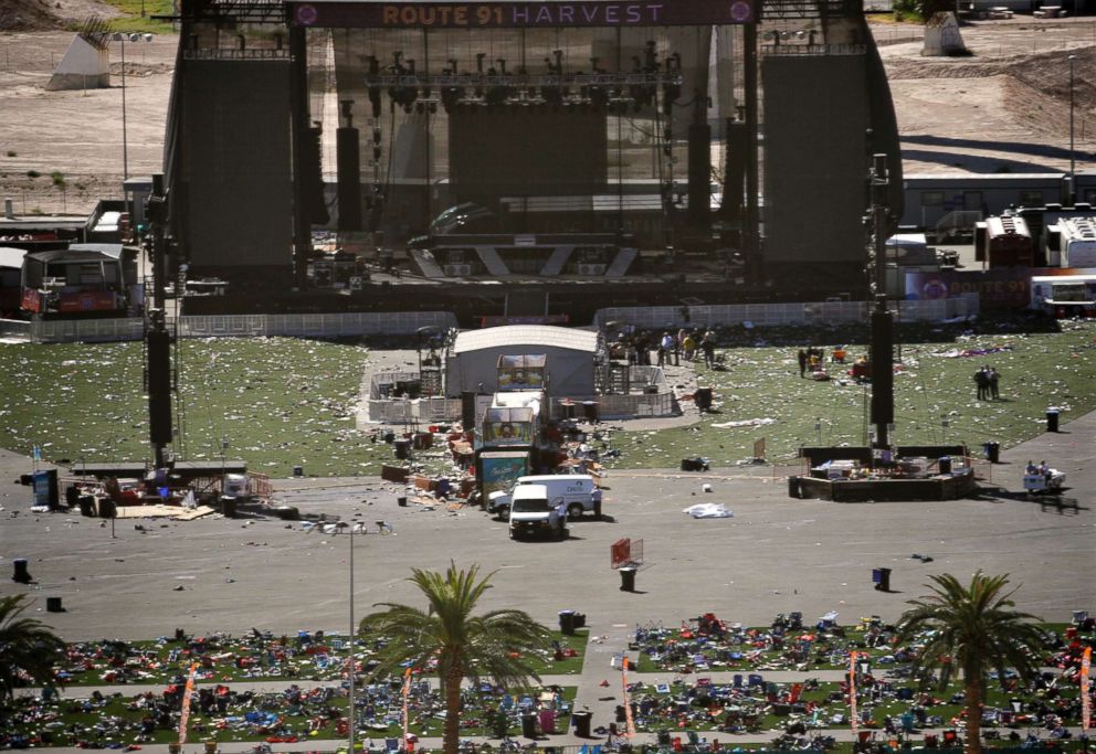 Debris is strewn through the scene of a mass shooting at a music festival near the Mandalay Bay resort and casino on the Las Vegas Strip, Oct. 2, 2017, in Las Vegas.