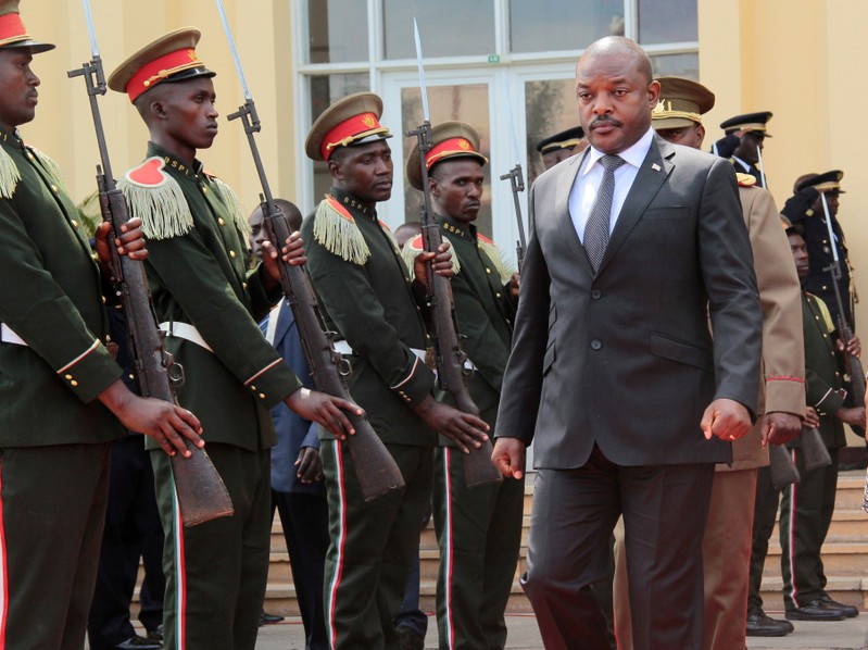 FILE PHOTO: Burundi's President Pierre Nkurunziza walks during a ceremony in tribute to the former late President Colonel Jean-Baptiste Bagaza at the national congress palace in Bujumbura, Burundi