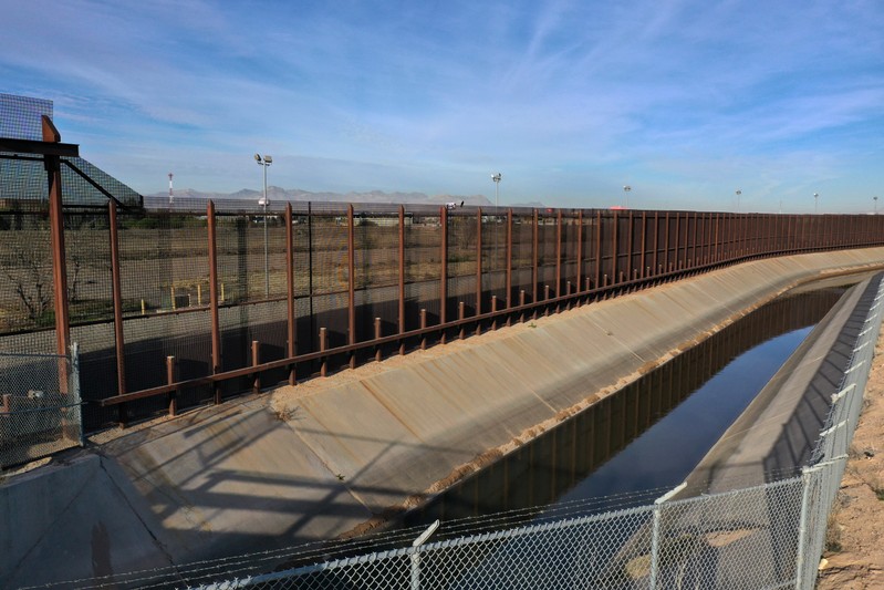 The U.S.-Mexico border fence is seen in El Paso