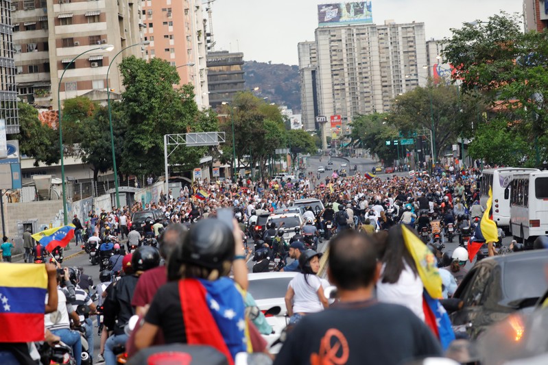 People throng the streets to protest against Venezuelan President Nicolas Maduro's government in Caracas