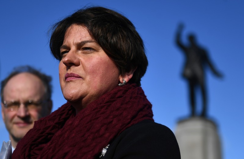 Northern Ireland's DUP leader Arlene Foster speaks to the media outside Stormont Parliament Building in Belfast