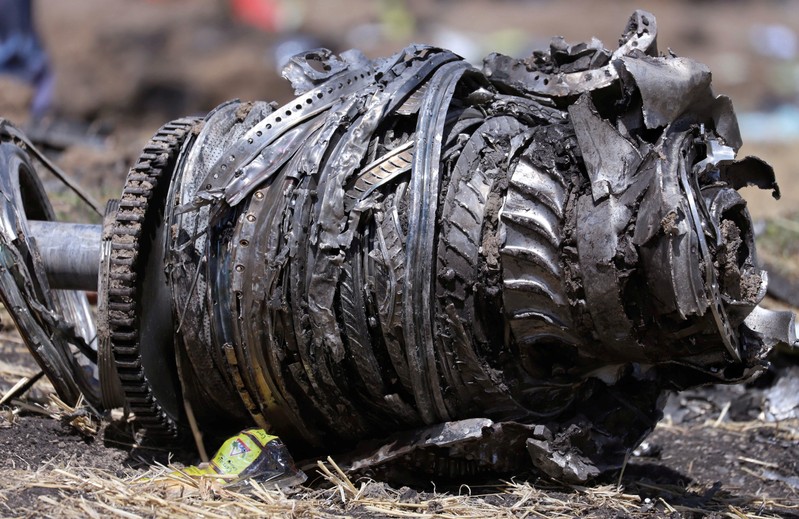 FILE PHOTO: Airplane engine parts are seen at the scene of the Ethiopian Airlines Flight ET 302 plane crash, near the town of Bishoftu