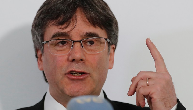 Former Catalan president Puigdemont reacts as trial over independence bid starts in Madrid