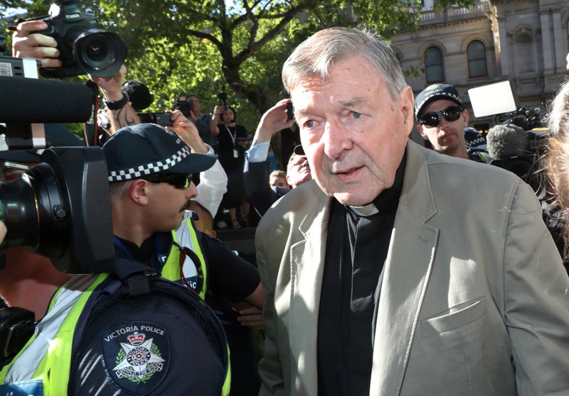 Cardinal George Pell arrives at County Court in Melbourne