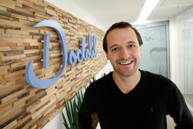 FILE PHOTO: Stanislas Niox-Chateau, Co-Founder & CEO of Doctolib, poses at the entrance of the company's headquarters in Paris