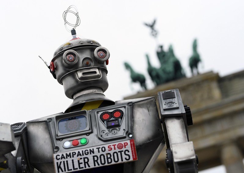 Activists from the Campaign to Stop Killer Robots, a coalition of non-governmental organisations opposing lethal autonomous weapons or so-called 'killer robots', stage a protest at Brandenburg Gate in Berlin