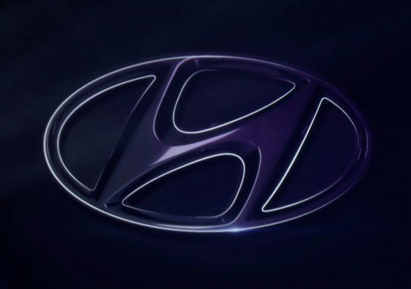 FILE PHOTO: The logo of Hyundai Motor is seen on wall at a event of Hyundai Motor Co's new Accent in Mexico City