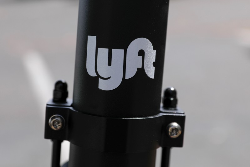 An electric scooter from the ride sharing company Lyft is shown on a downtown sidewalk in San Diego