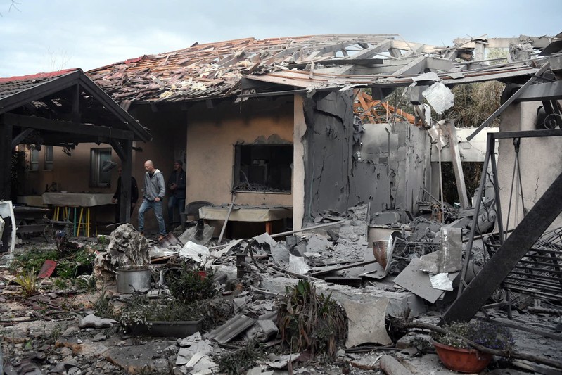 A damaged house that was hit by a rocket can be seen north of Tel Aviv