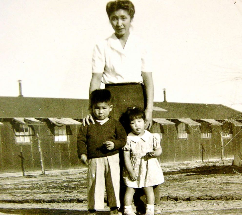 Shizuko Ina, Kiyoshi Ina and Satsuki Ina in Tule Lake after their father was taken and incarcerated in North Dakota. Photo taken at Tule Lake Segregation Center, Ca., 1945.