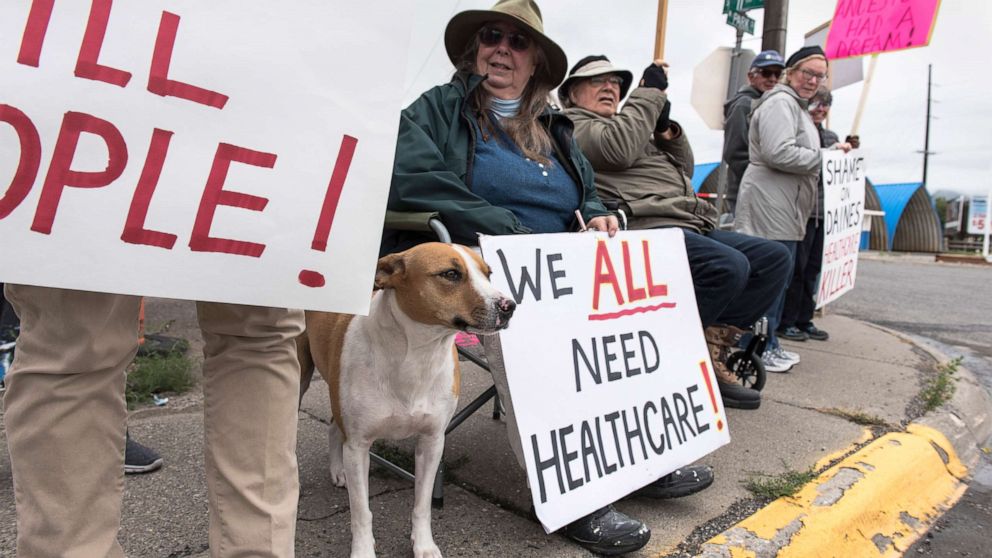 Protesters hold a small peaceful demonstration in support of health care on Sept. 23, 2017 in Livingston, Montana. The state of Montana expanded Medicaid under the Affordable Care Act.