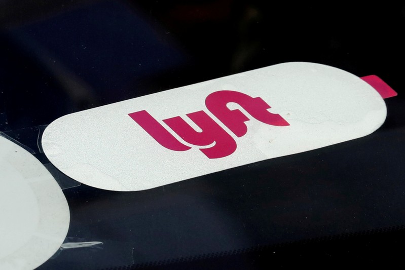 FILE PHOTO: The Lyft logo is seen on ride-hailing car in Manhattan in New York City