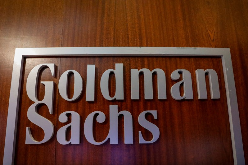 The Goldman Sachs company logo is seen in the company's space on the floor of the NYSE in New York