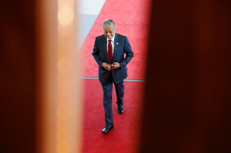 FILE PHOTO: Malaysia's Prime Minister Mahathir Mohamad arrives at APEC Haus, during the APEC Summit in Port Moresby, Papua New Guinea