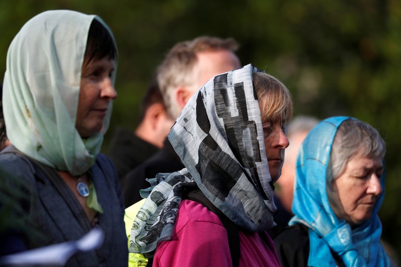 Women attend a vigil for the victims of the mosque attacks during an ecumenical celebration in Christchurch