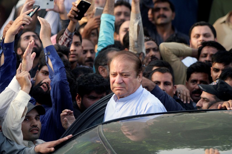 FILE PHOTO: Former Prime Minister Nawaz Sharif arrives to attend funeral services for his wife, Kulsoom, in Lahore
