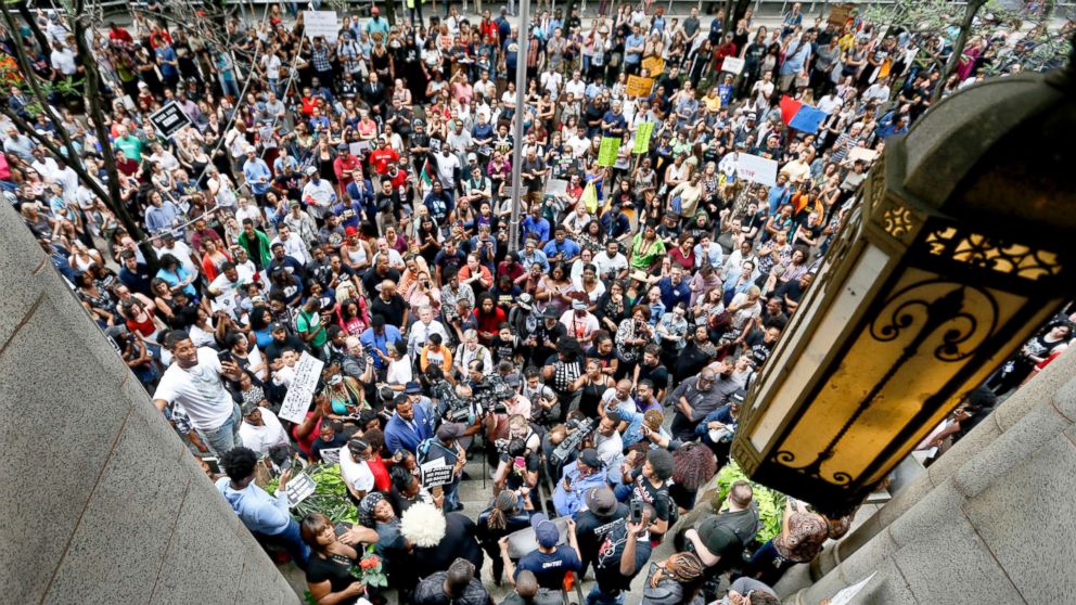 Protesters swarm the front of the Allegheny County Courthouse as they rally, June 21, 2018 in Pittsburgh for the killing of Antwon Rose Jr. who was fatally shot by a police officer.